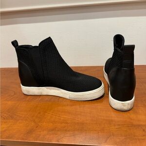 Black heeled sneaker bootie